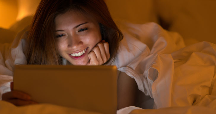 Girl Watching Movies In Bed